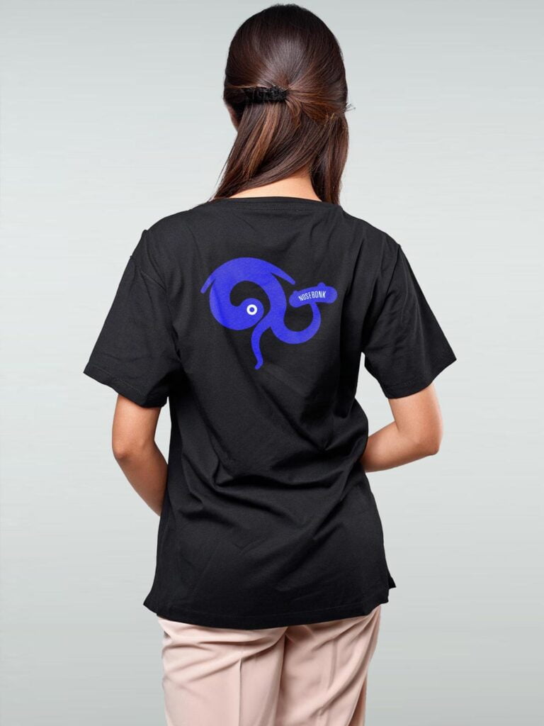 Black T-Shirt with blue abstract figure doing a Backside Boneless skate trick. Unique Skate Shirts