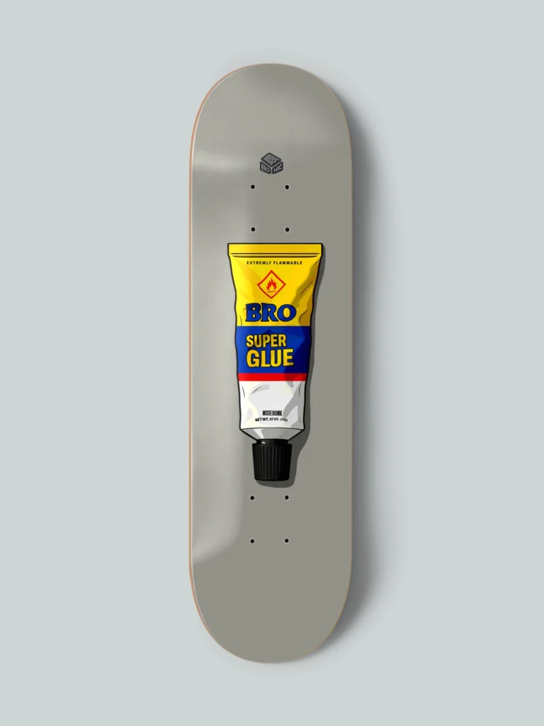 Skateboard deck design by Nosebonk – featuring a retro super glue tube labeled "BRO", centered on a grey board with realistic shadows and packaging details.