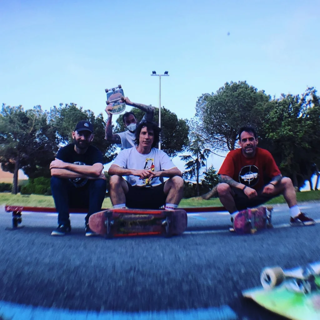 Part ot the Nosebonk Crew During Covid skaters sitting on a skate bench