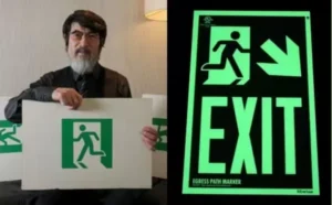 Green ISO emergency exit sign designed by Yukio Ota in 1979, now used worldwide